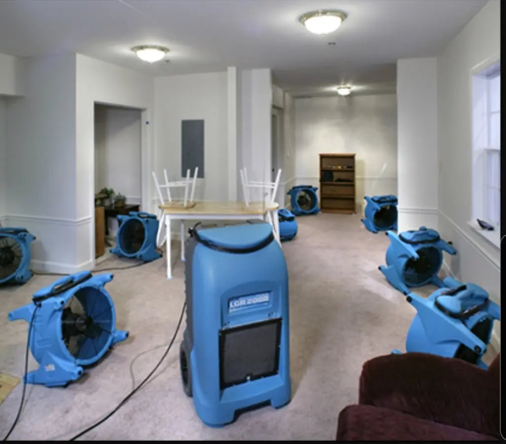 Air movers and dehumidifier setup for Water Extraction & Removal in Willmar